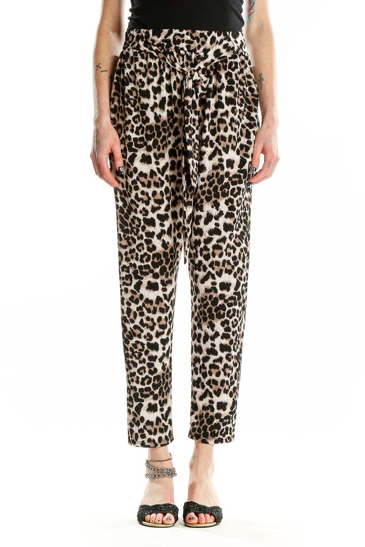 Front view of Entro leopard print tapered pants with tie-front detail