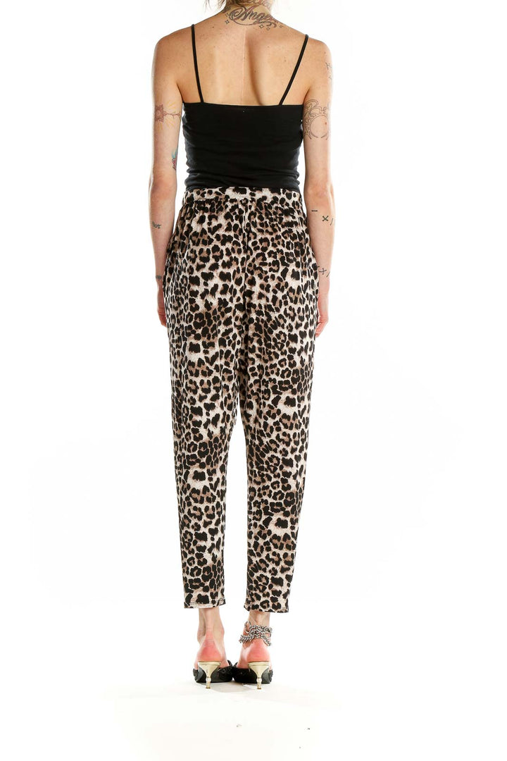 Back view of Entro leopard print tapered pants showing fit and pattern