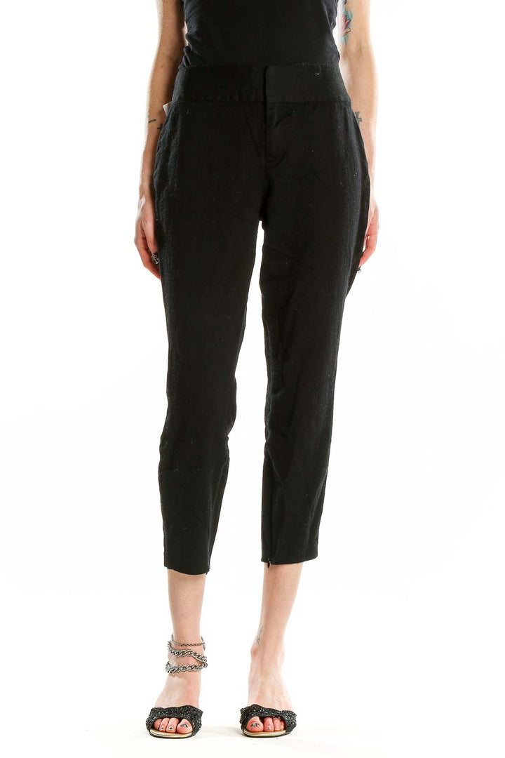 Front view of Alice + Olivia black cropped wool-blend trousers