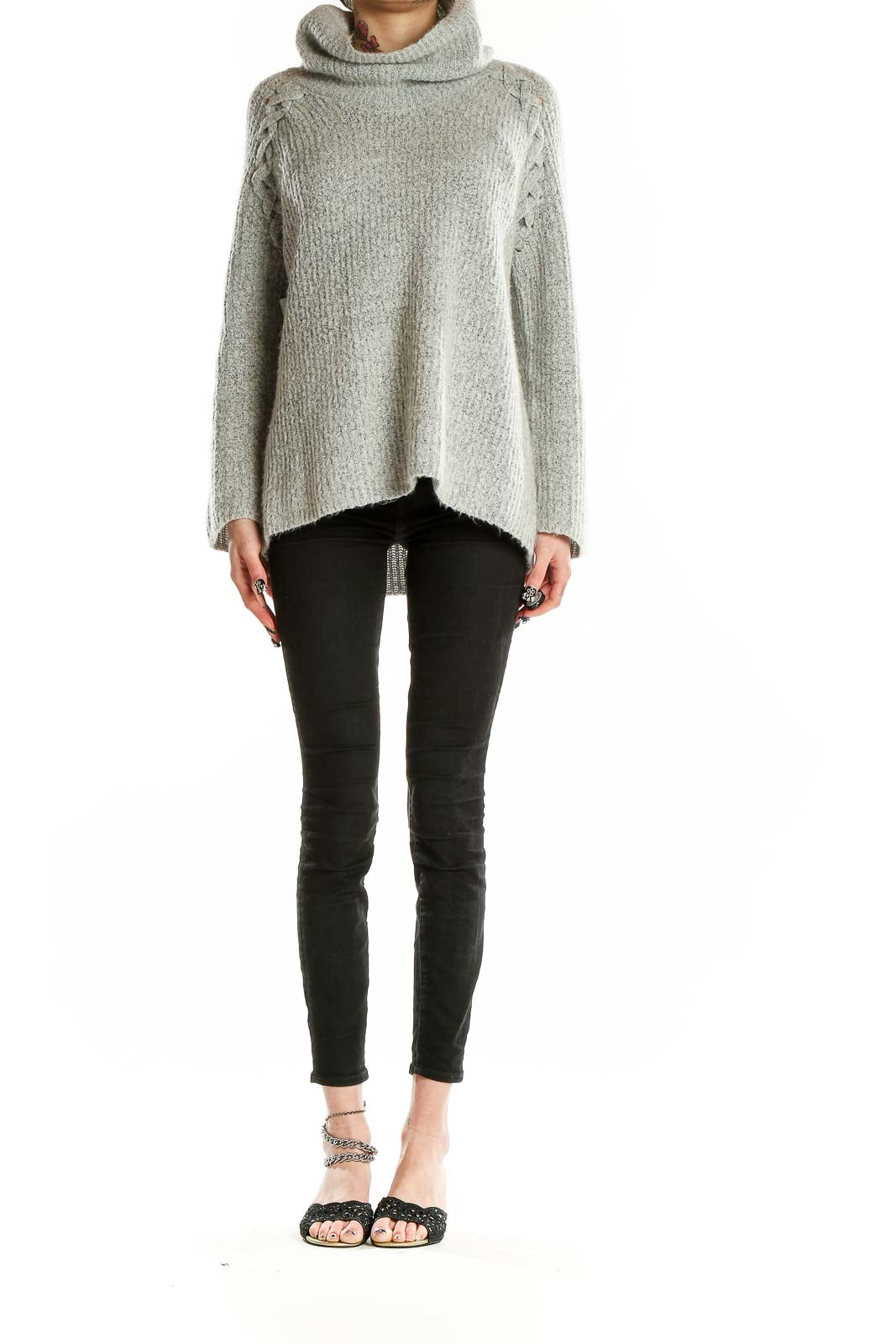 Front view of gray cowl neck sweater with lace-up shoulder details