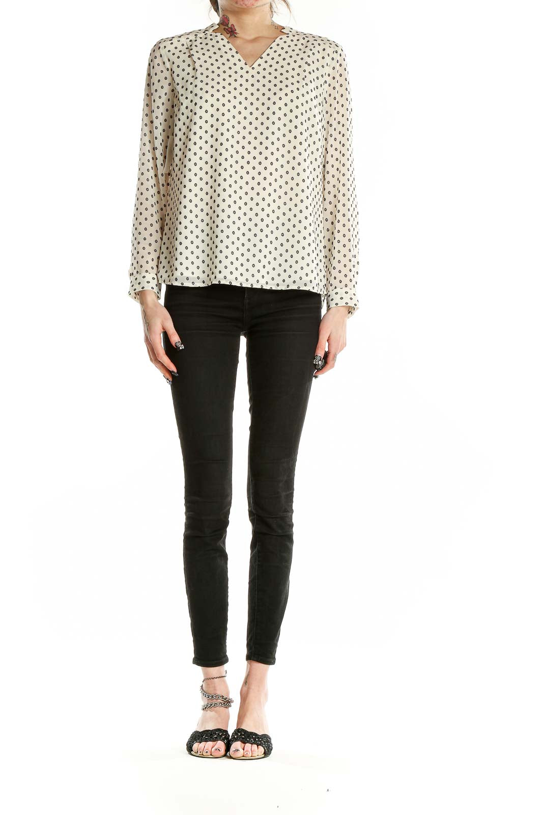 Front view of Talbots cream polka dot long sleeve blouse with V-neck