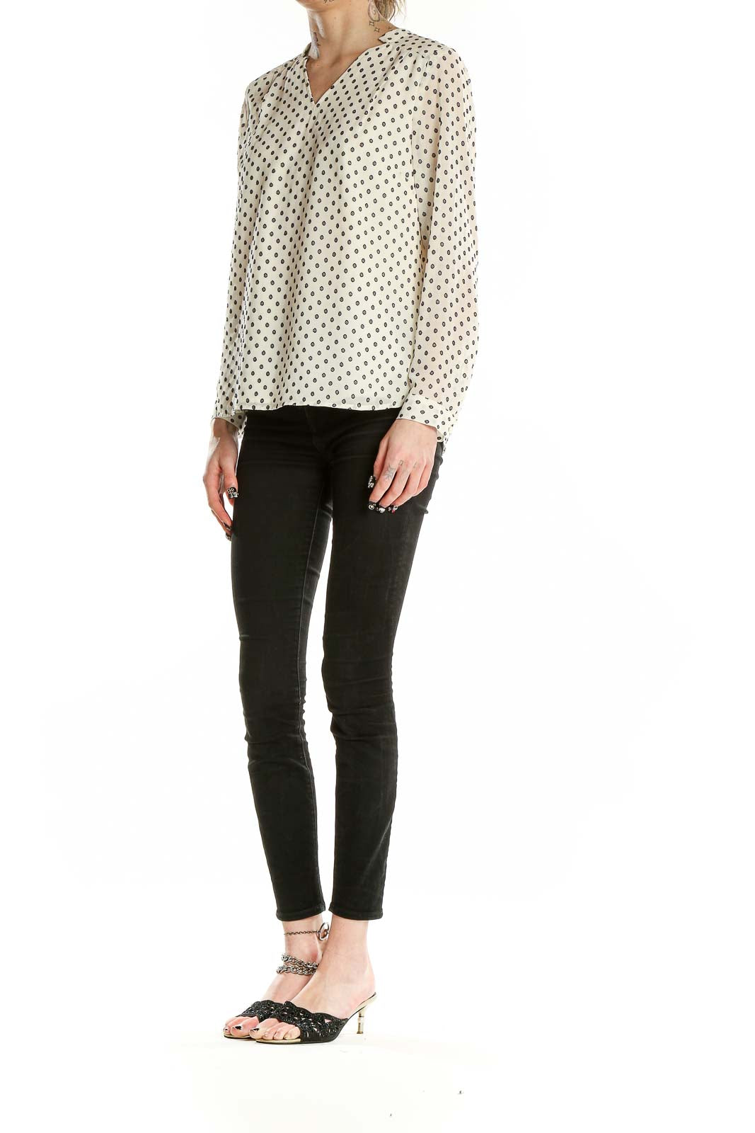 Front view of Talbots cream polka dot long sleeve blouse with V-neck