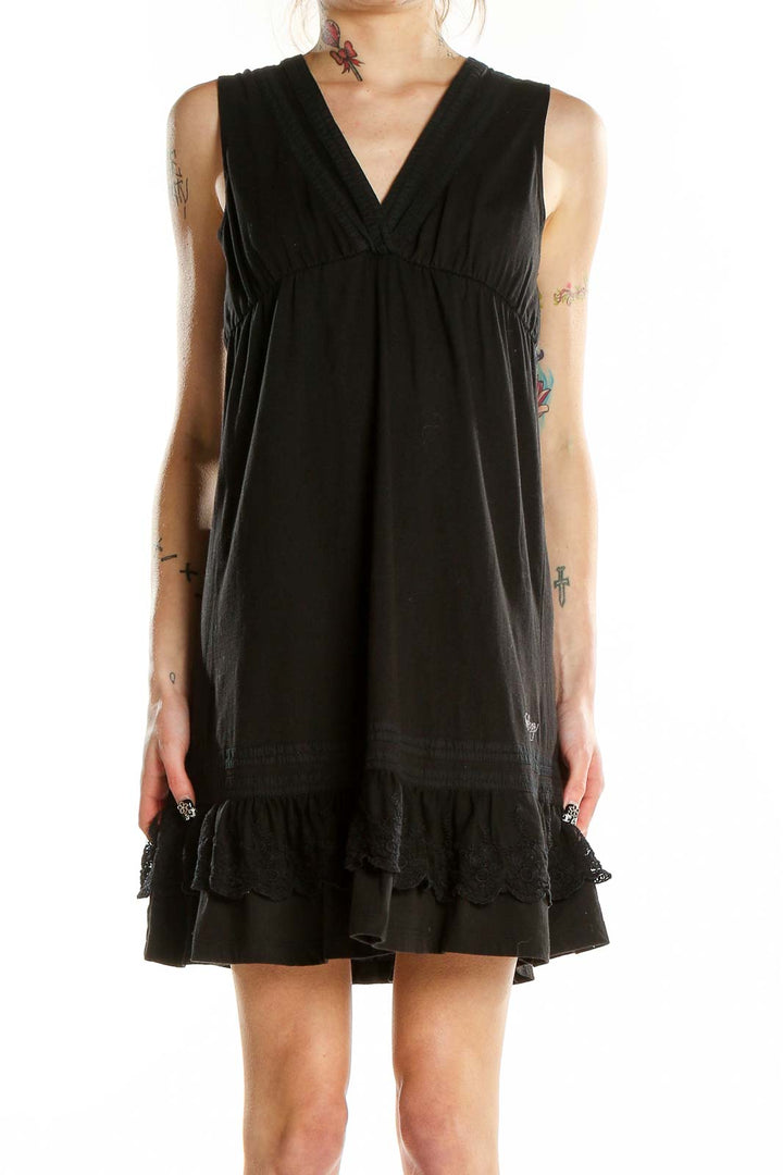 Front view of Billabong black sleeveless V-neck dress with ruffle hem