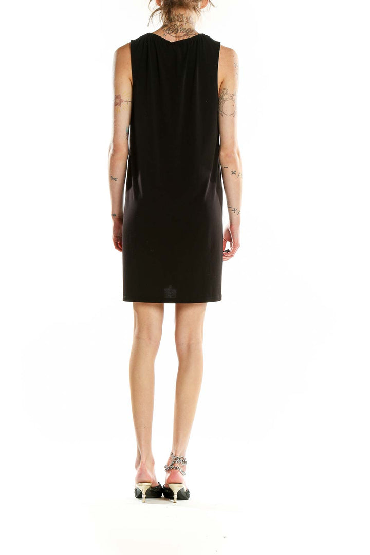 Back view of MICHAEL Michael Kors black sleeveless shift dress