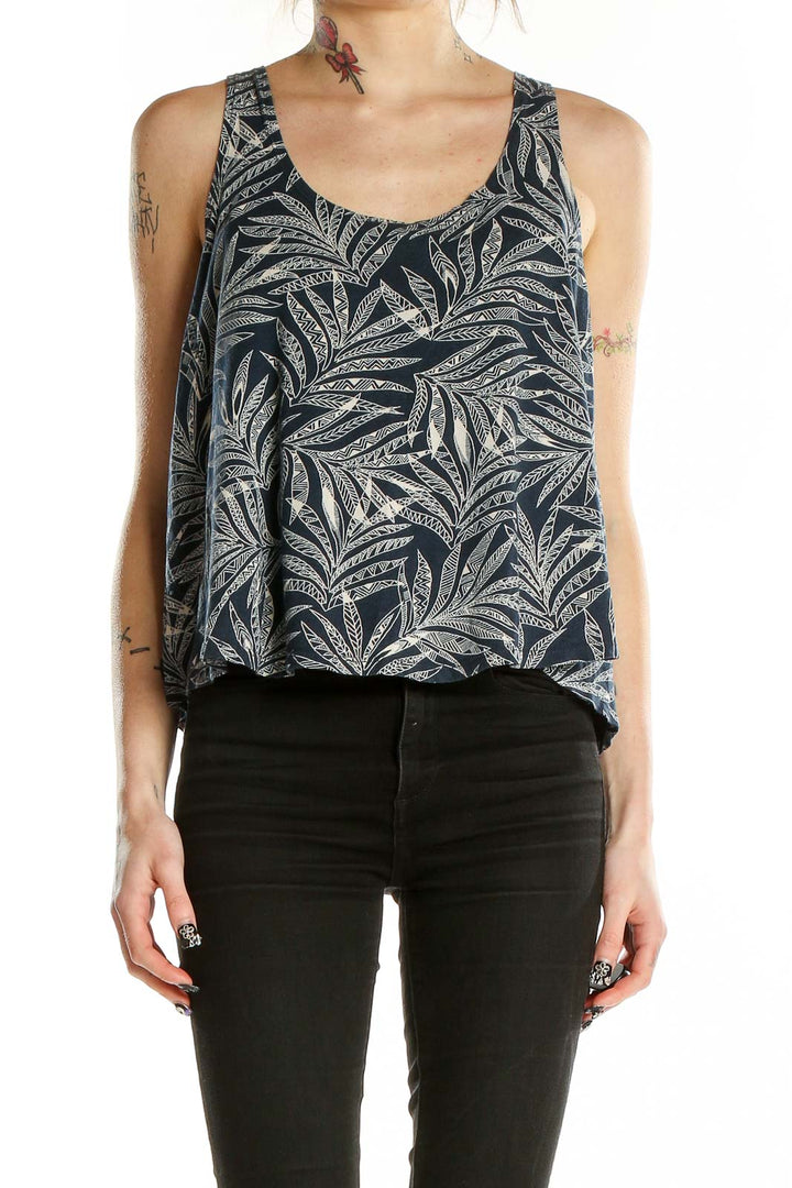 Front view of VOLCOM navy tank top with tropical leaf print