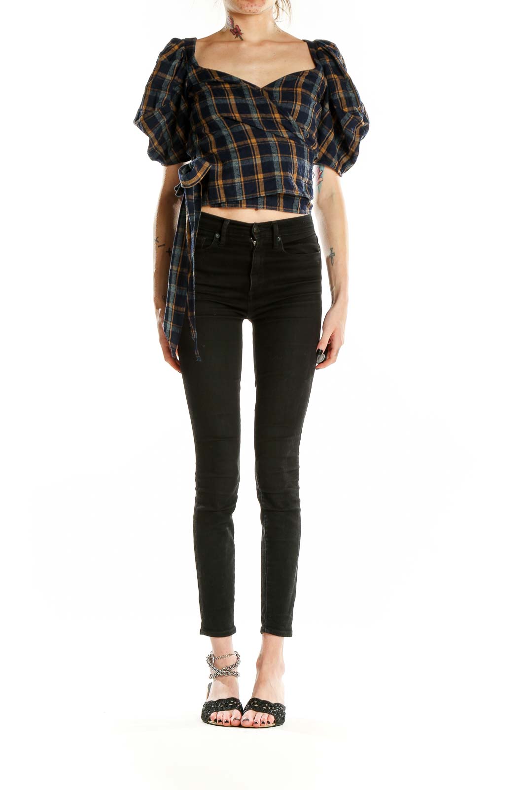 Front view of Madewell navy plaid puff-sleeve wrap top with sweetheart neckline