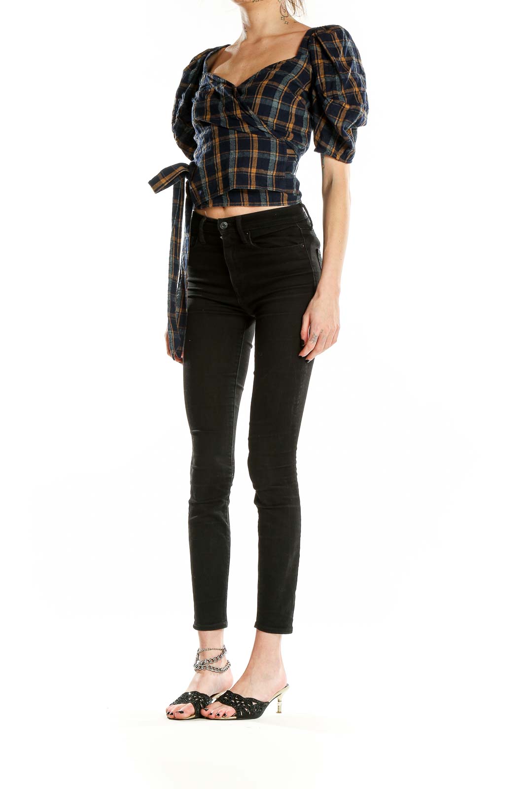 Front view of Madewell navy plaid puff-sleeve wrap top with sweetheart neckline