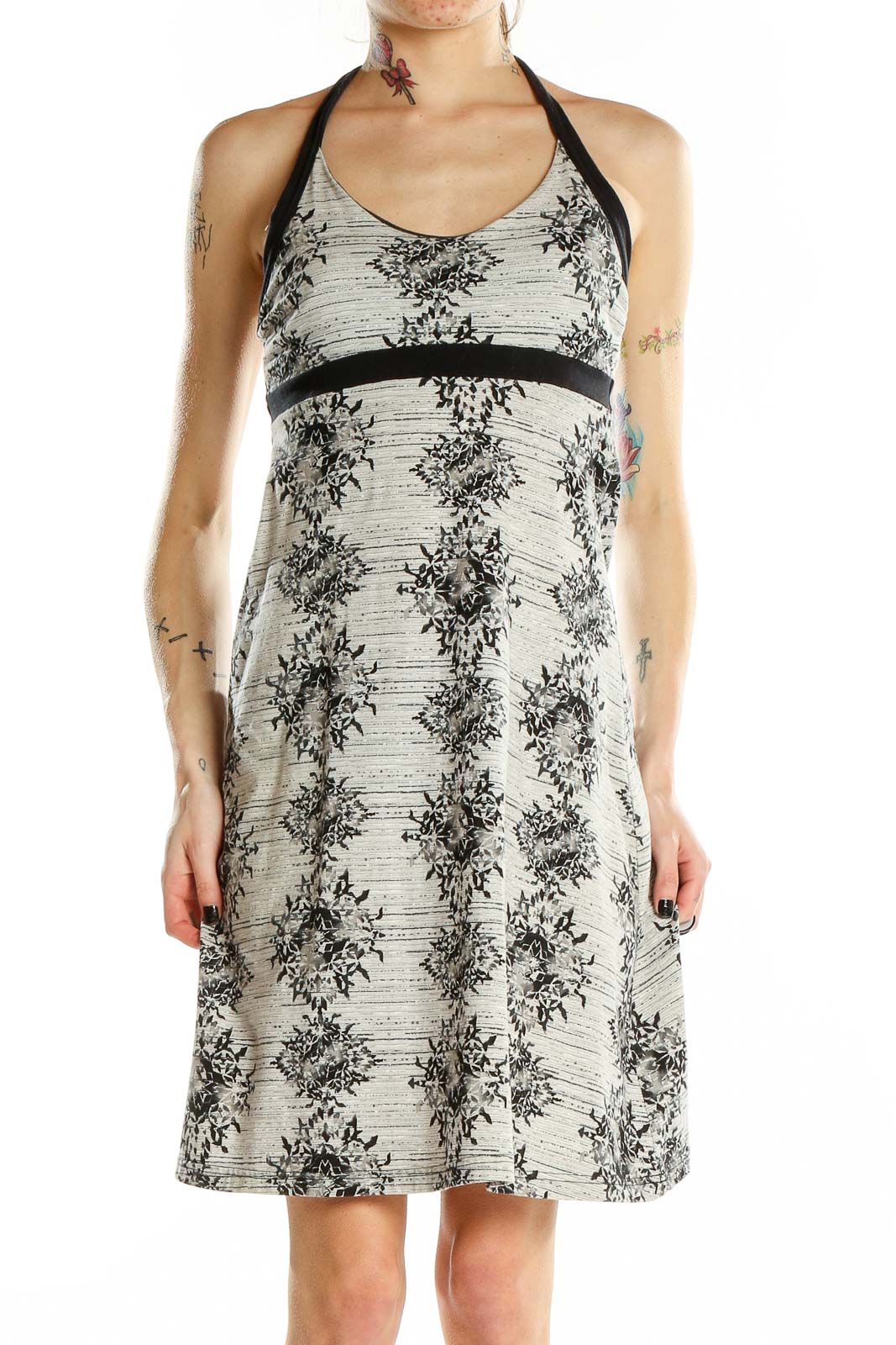 Front view of Patagonia gray floral halter sundress with empire waist