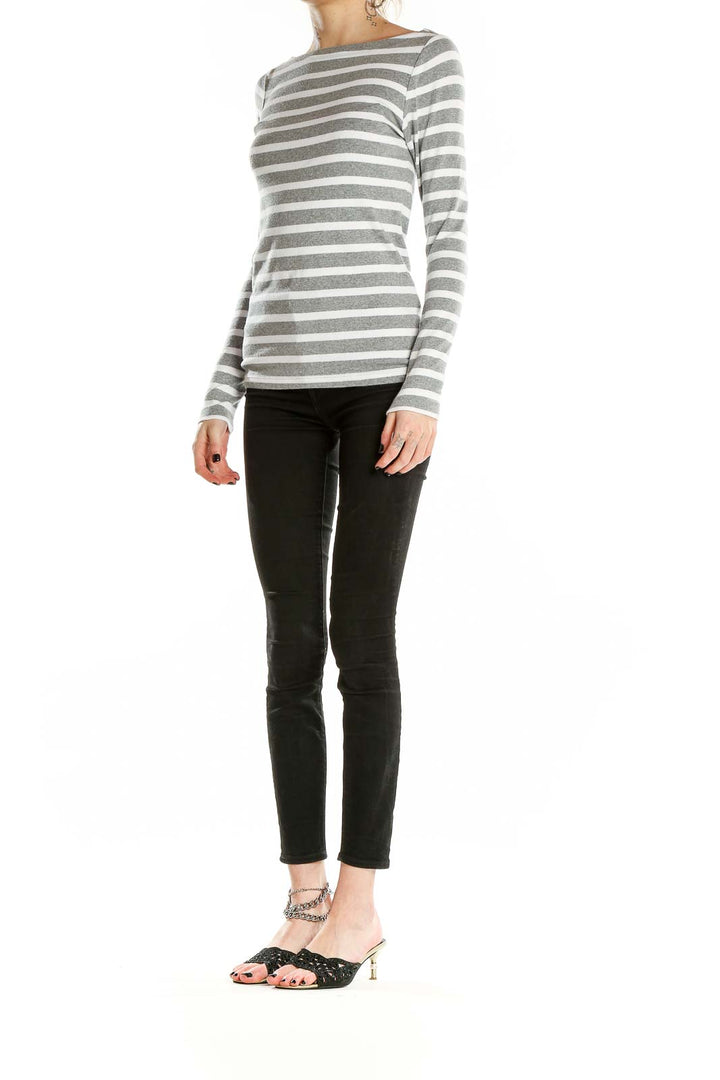 Front view of Gap gray and white striped long sleeve top