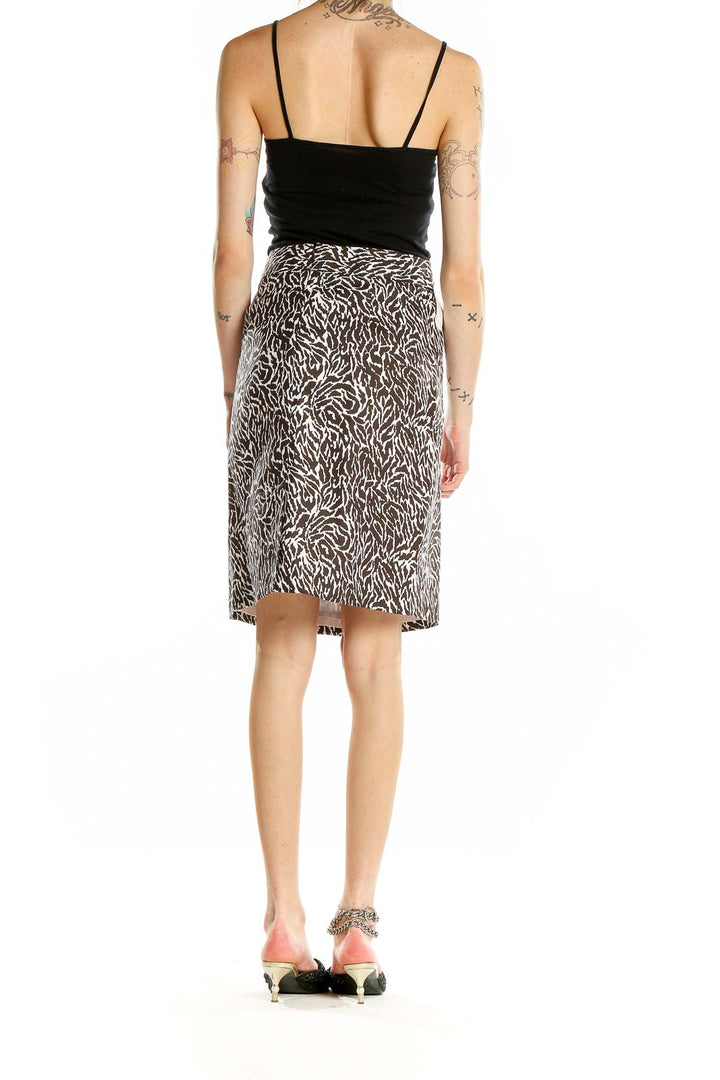 Back view of Ann Taylor LOFT brown and white animal print skirt