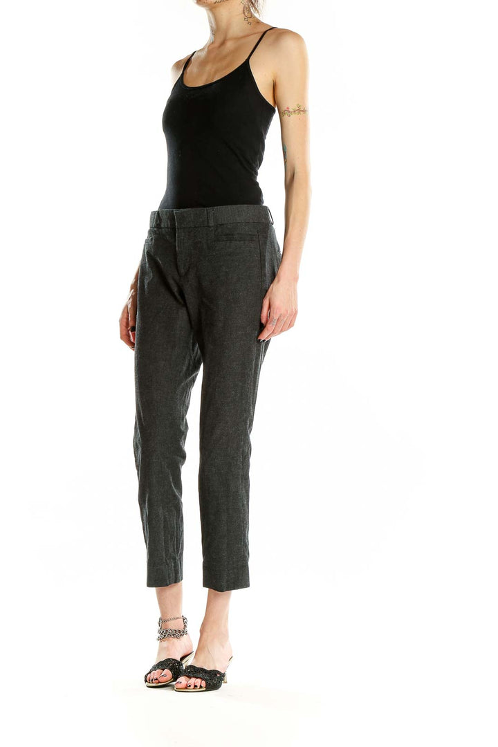 Front view of Banana Republic charcoal gray cropped pants on model