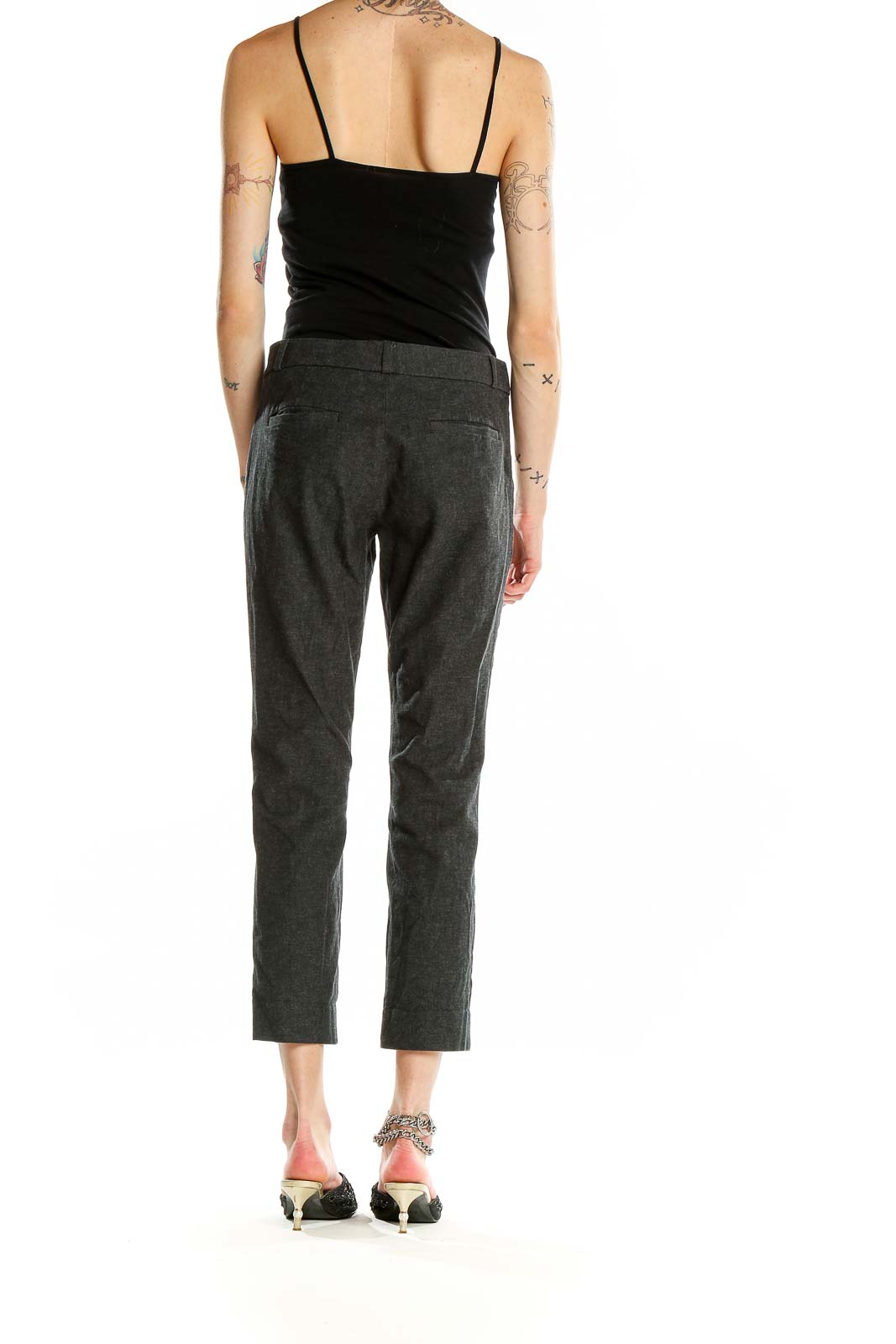 Back view of Banana Republic charcoal gray cropped pants on model