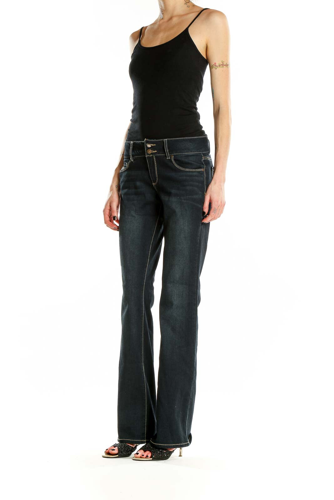 Front view of altar'd state dark blue bootcut jeans on model