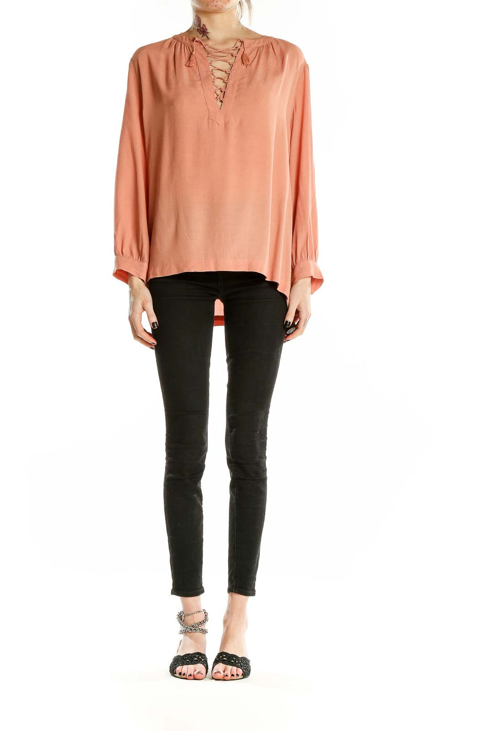 Front view of Madewell peach lace-up V-neck blouse