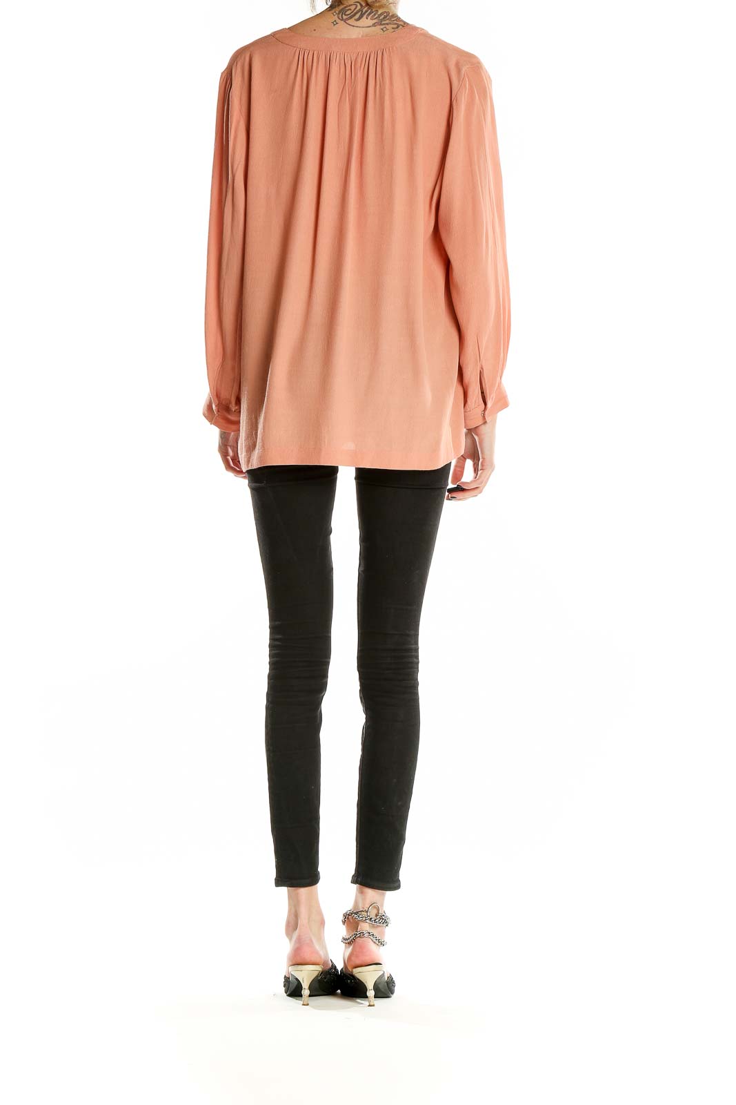 Back view of Madewell peach flowy blouse with high-low hem