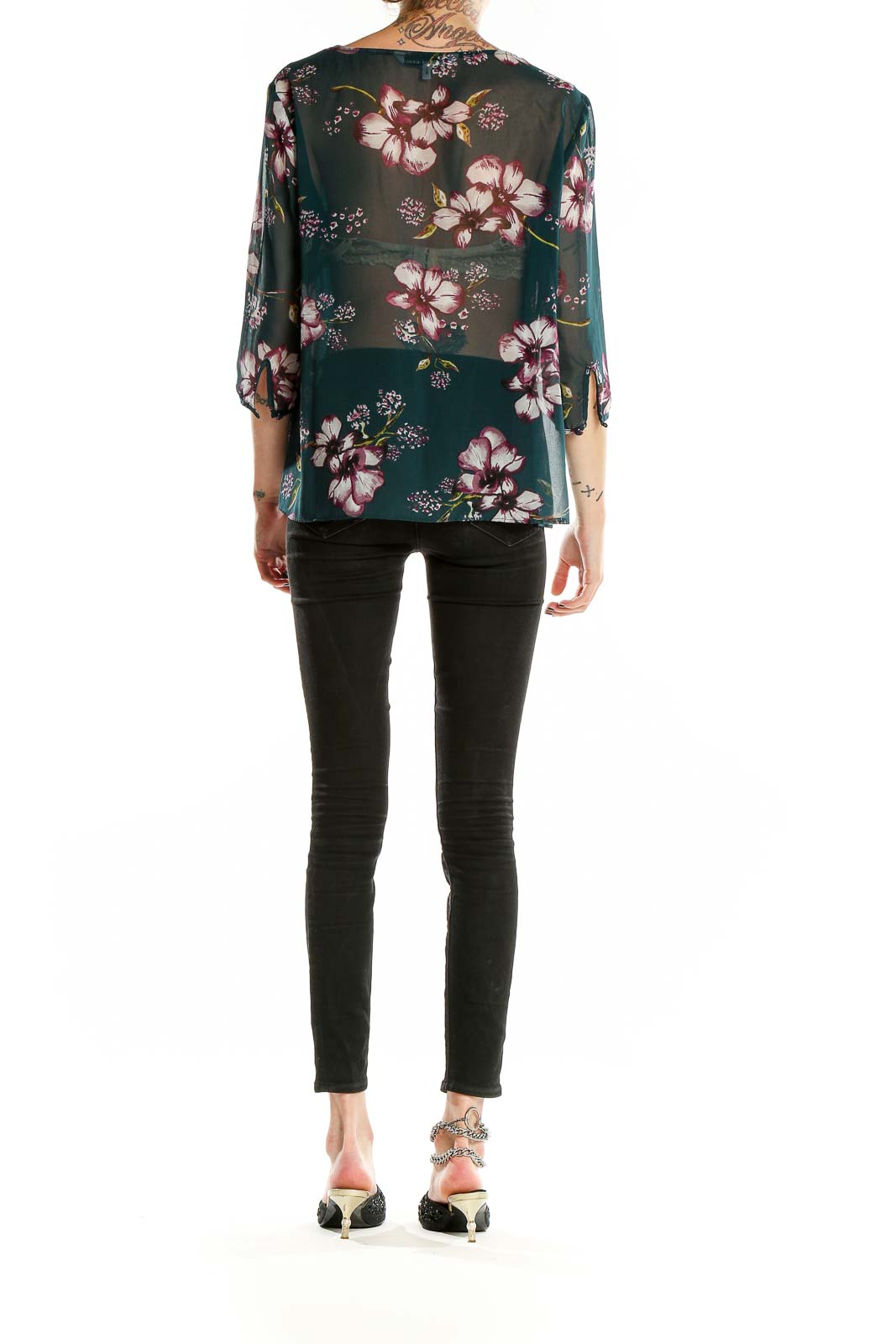 Back view of Cupcakes and Cashmere green floral blouse showing all-over print and relaxed fit