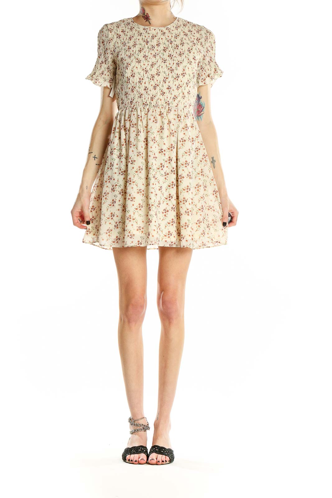 Front view of Sugar + Lips cream floral mini dress with smocked bodice and flutter sleeves