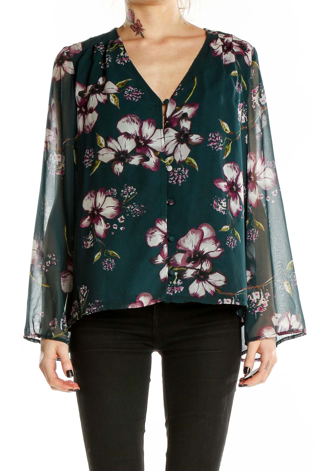 Front view of Cupcakes and Cashmere green floral blouse with V-neckline