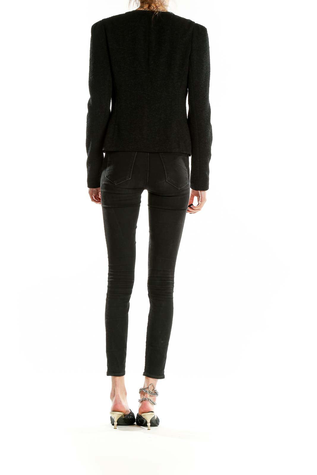 Back view of Ann Taylor black textured jacket showing sleek silhouette