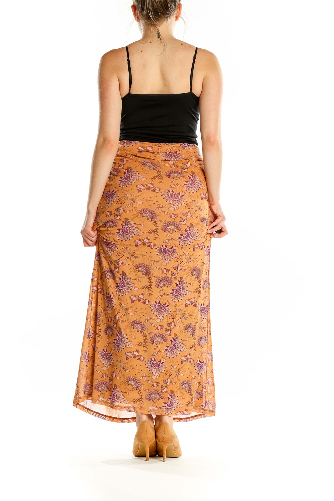 Back view of House of Harlow 1960 orange floral maxi skirt on model