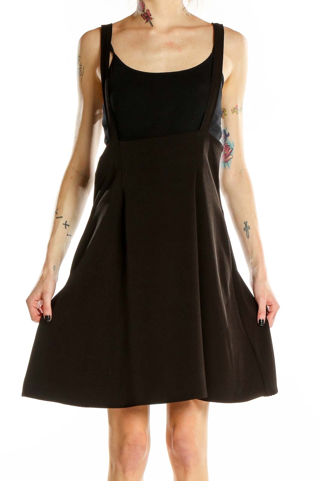 Front view of ModCloth black flared suspender skirt on model