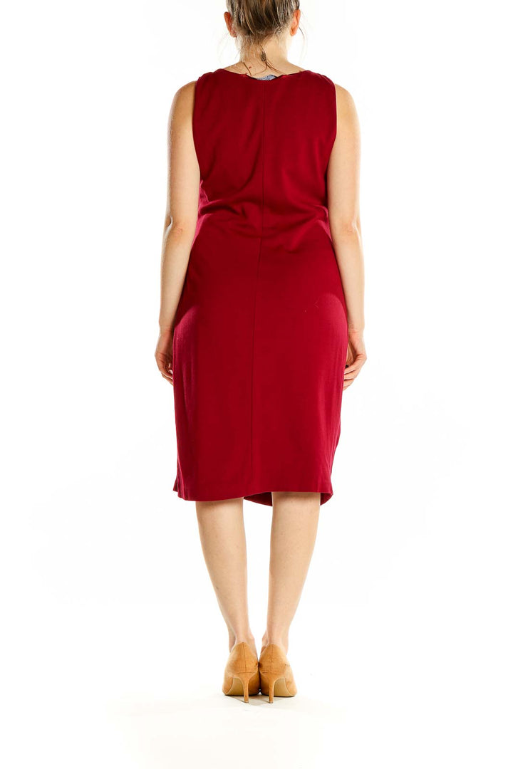 Back view of red Elie Tahari midi dress showing sleeveless design