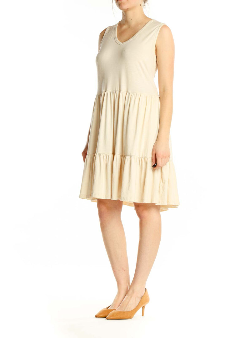 Front view of Toad&Co cream tiered sleeveless summer dress