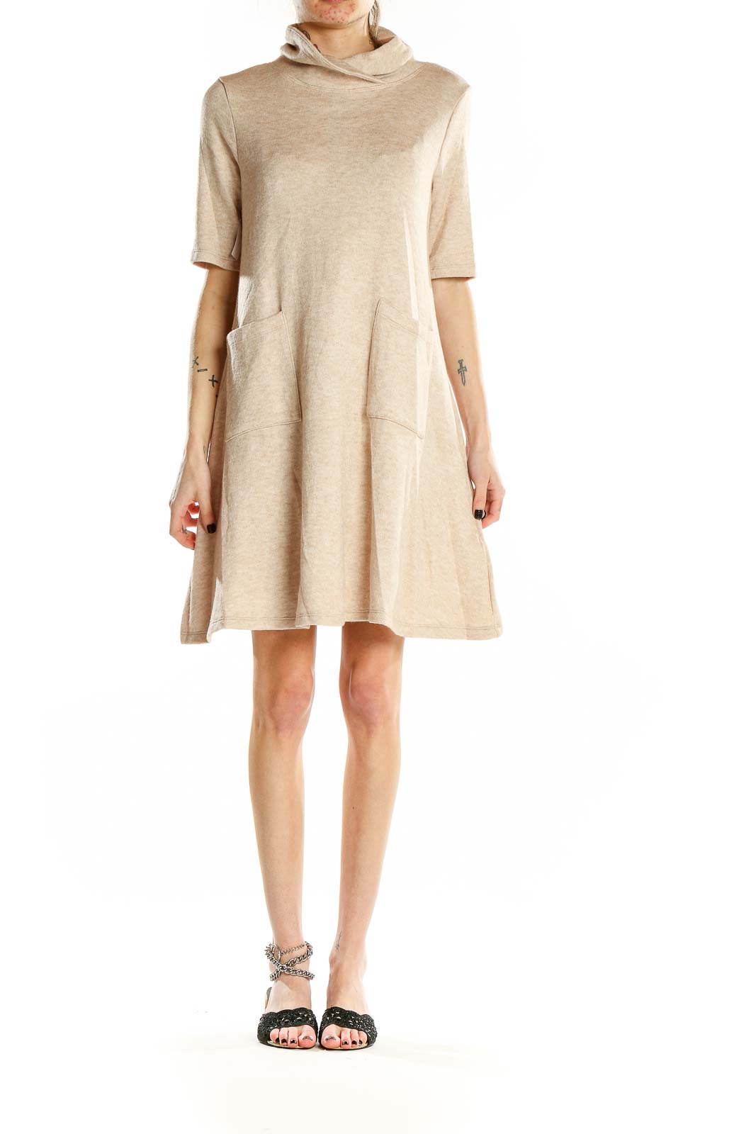 Front view of beige turtleneck swing dress with pockets