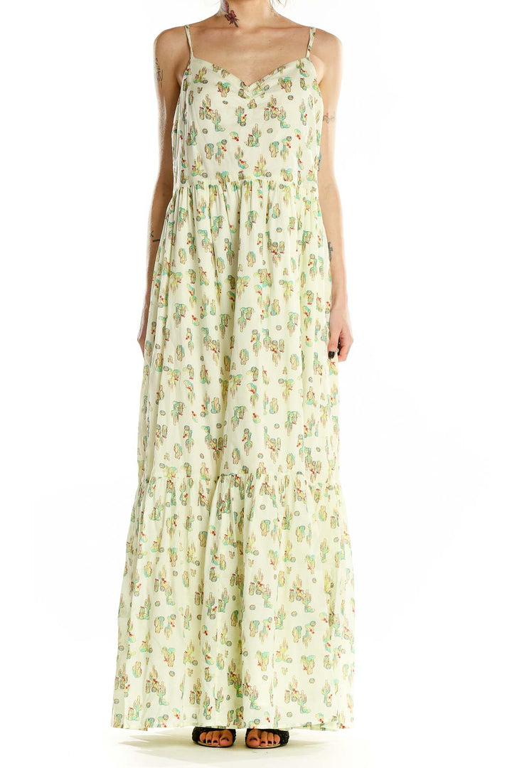 Front view of ModCloth yellow floral maxi dress with cactus print and spaghetti straps