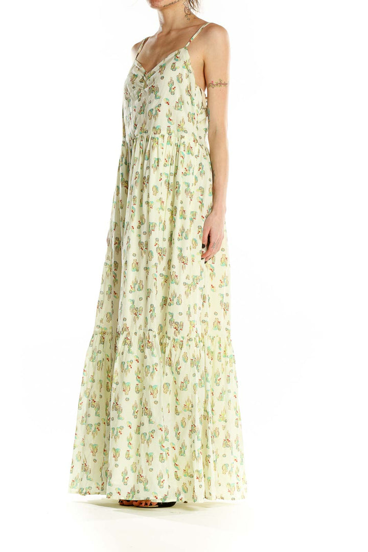 Front view of ModCloth yellow floral maxi dress with cactus print and spaghetti straps