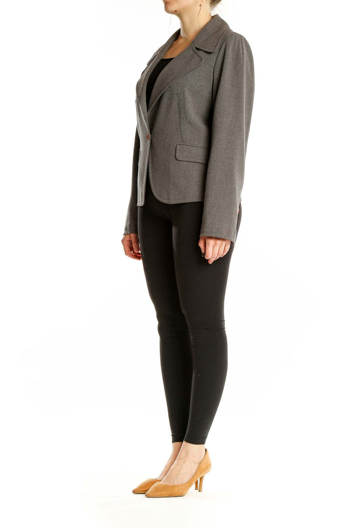 Front view of gray JÔN tailored blazer with single-button closure