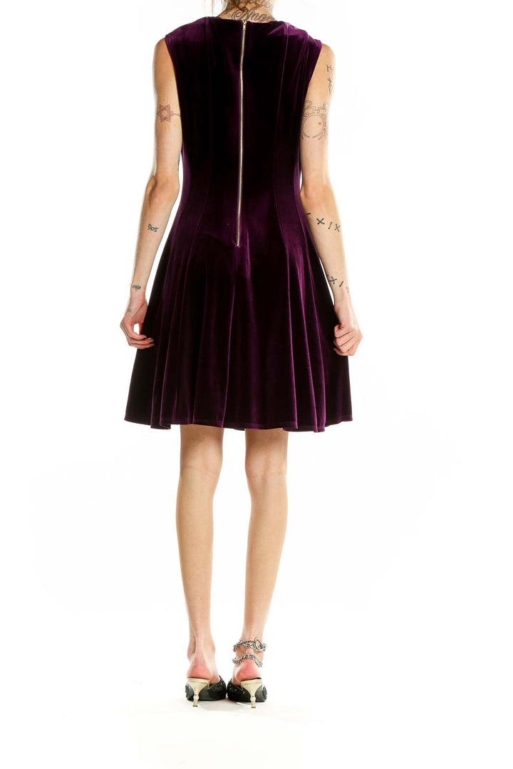 Back view of purple velvet sleeveless fit-and-flare dress with zipper closure