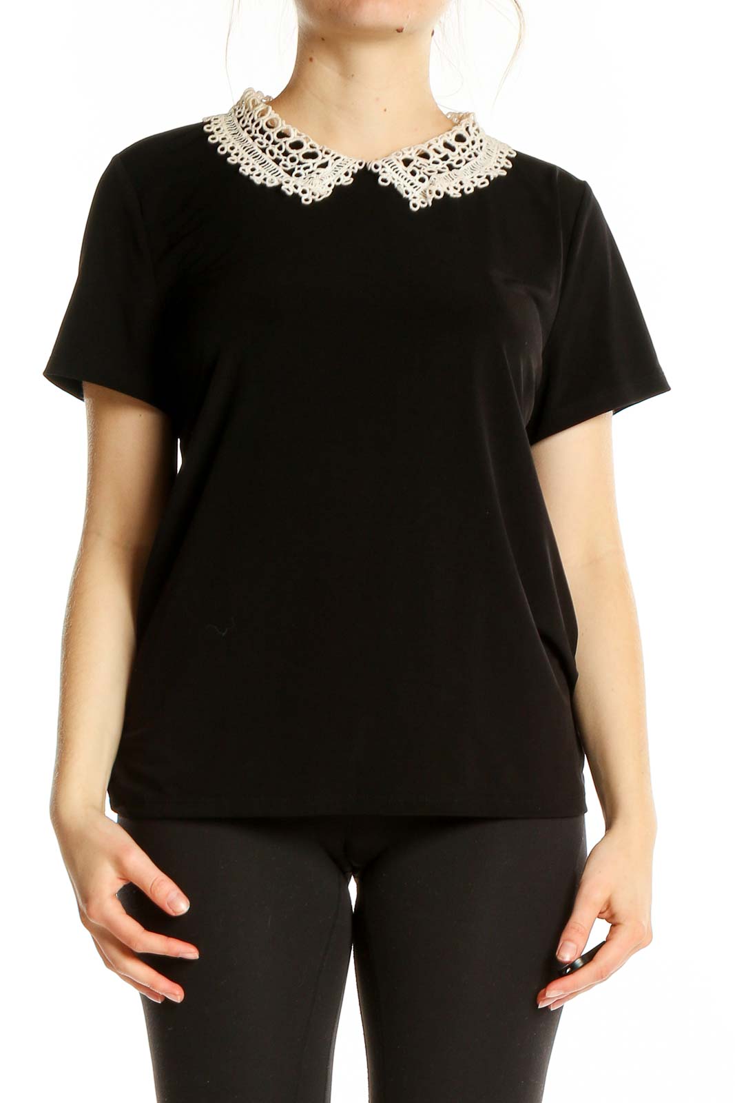 Front view of Karl Lagerfeld black top with white lace collar