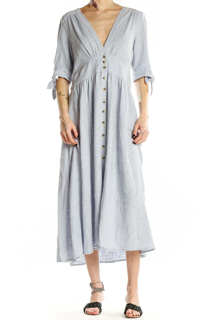 Front view of light blue Free People button-front midi dress with tie sleeves