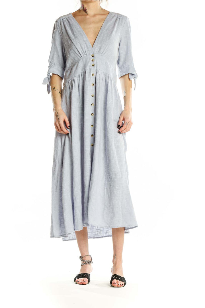 Front view of light blue Free People button-front midi dress with tie sleeves