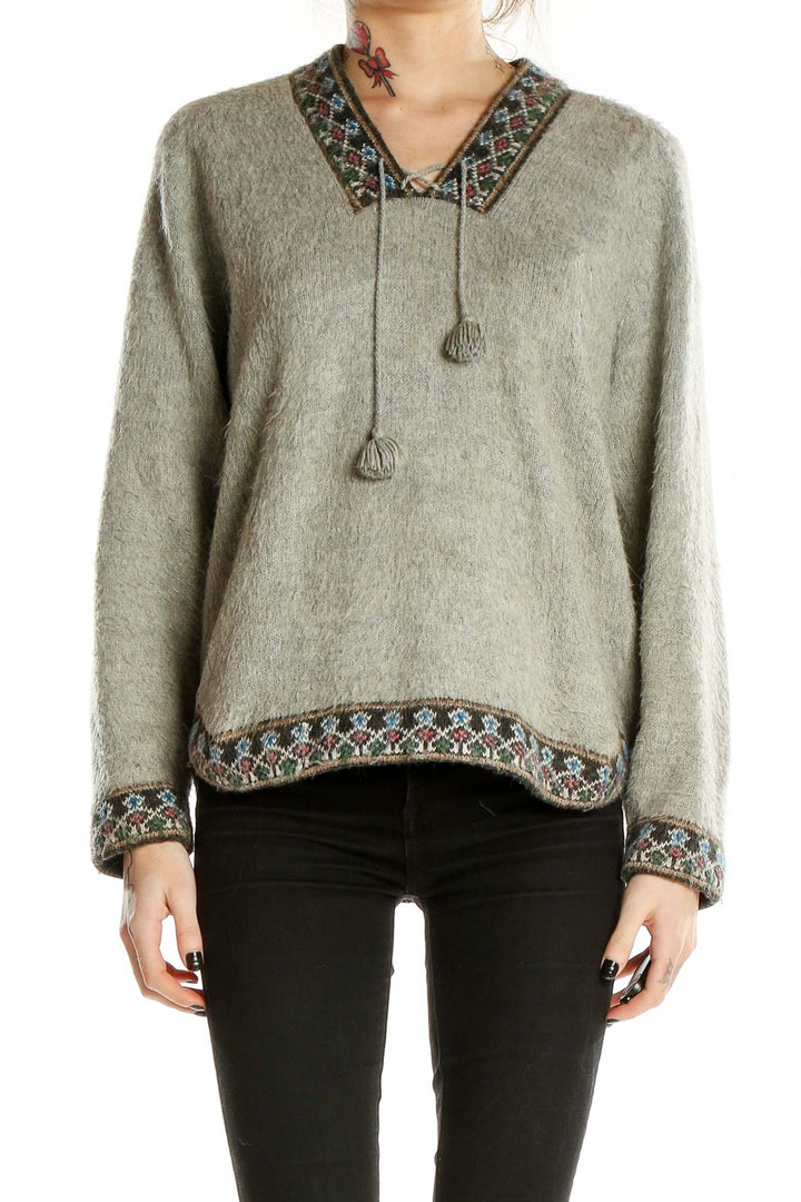 Front view of gray SilkRoll knit sweater with embroidered V-neck and hem