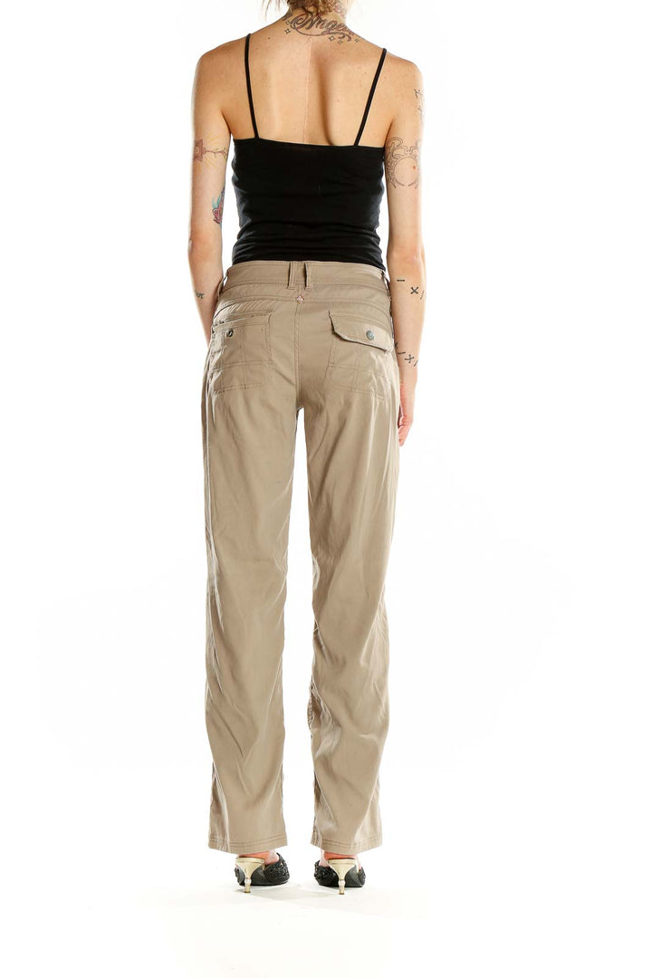 Back view of prAna khaki outdoor pants showing rear pockets