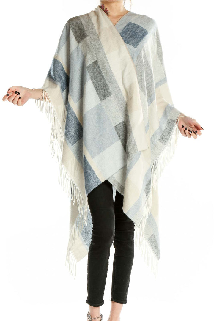 Front view of Zighilli gray and white geometric knit poncho with fringed edges