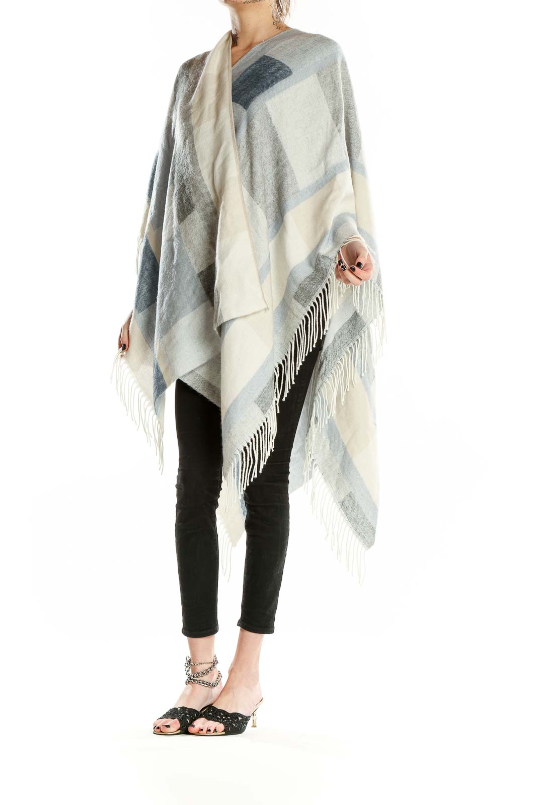 Front view of Zighilli gray and white geometric knit poncho with fringed edges