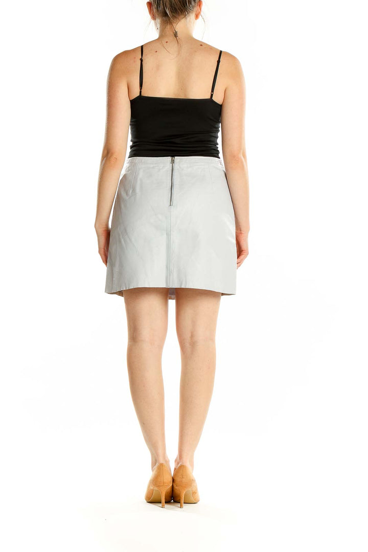 Back view of French Connection light gray leather mini skirt with zipper closure