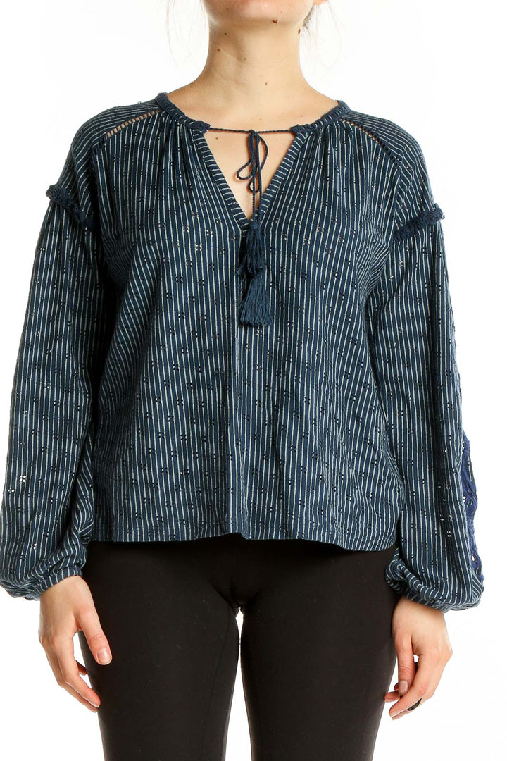 Front view of Lucky Brand navy striped peasant blouse with tassel-tied neckline