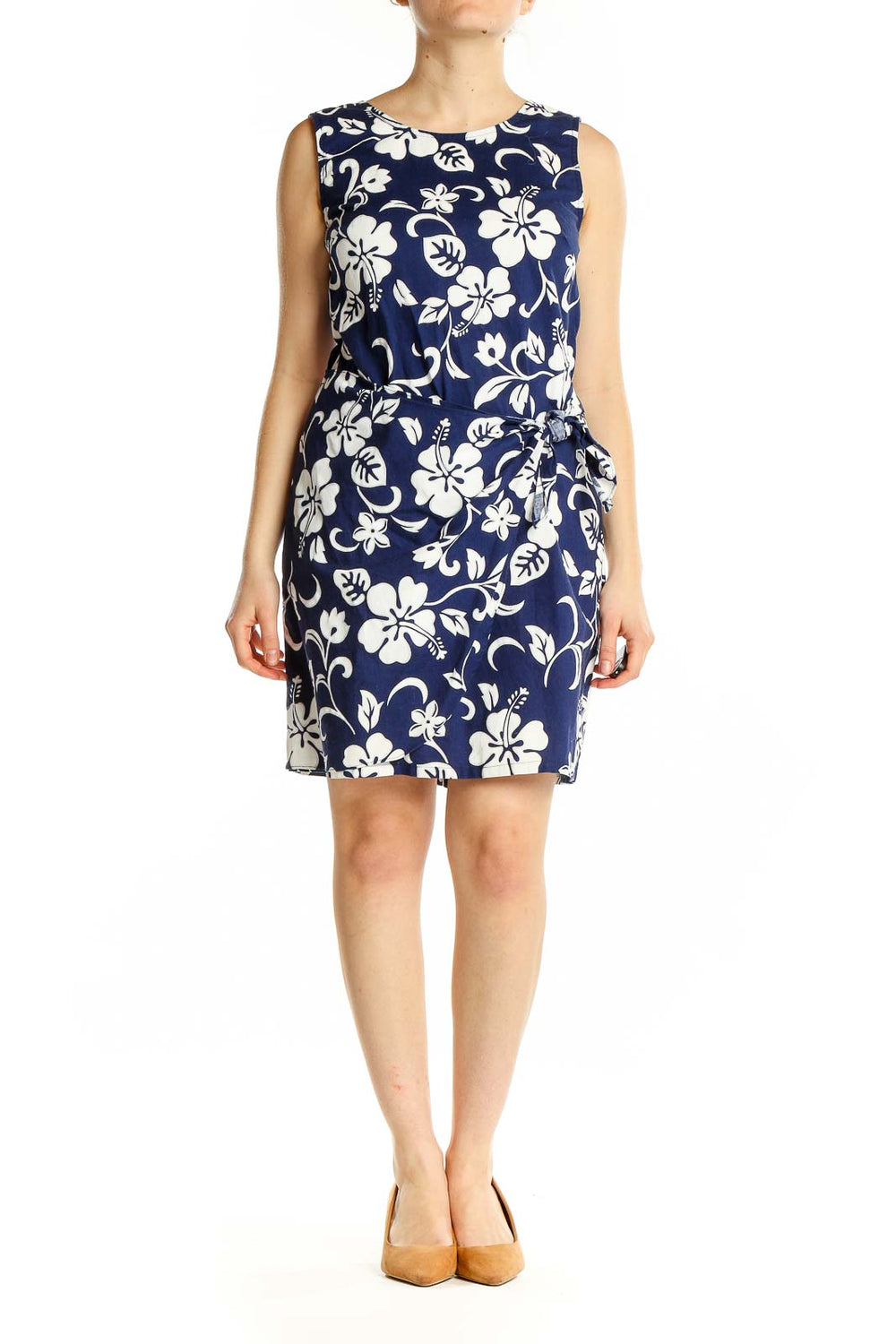 Front view of Shannon Marie navy and white floral print sleeveless cotton dress with side tie