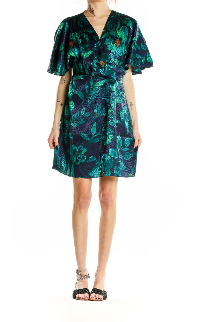 Front view of London Times green floral wrap dress with flutter sleeves