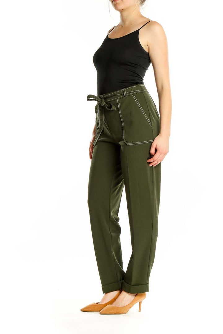 Front view of NYCC olive green straight-leg pants with self-tie belt