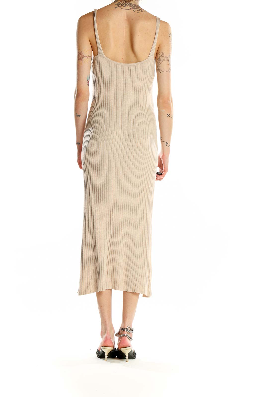 Back view of beige ribbed midi dress from MNG showing sleek design and midi length