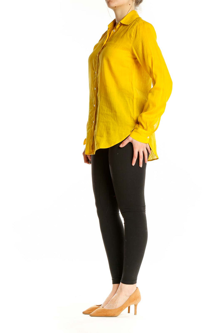 Front view of LOFT yellow button-down shirt with long sleeves