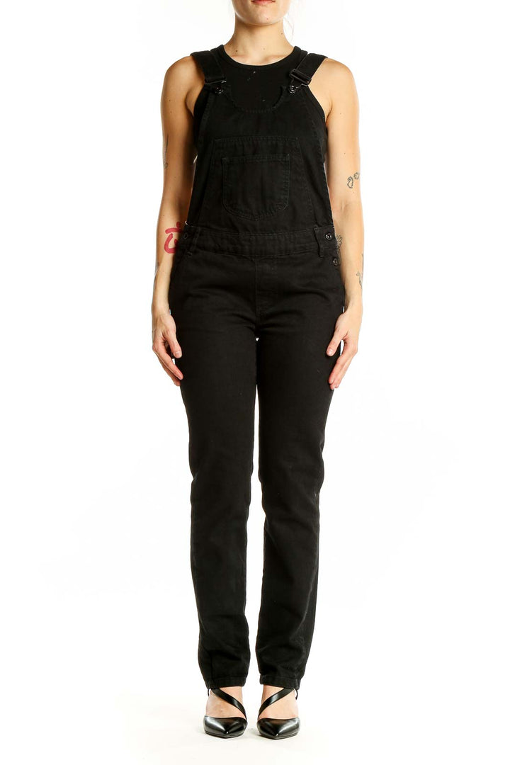 Front view of black cotton sleeveless jumpsuit from Zara Basic