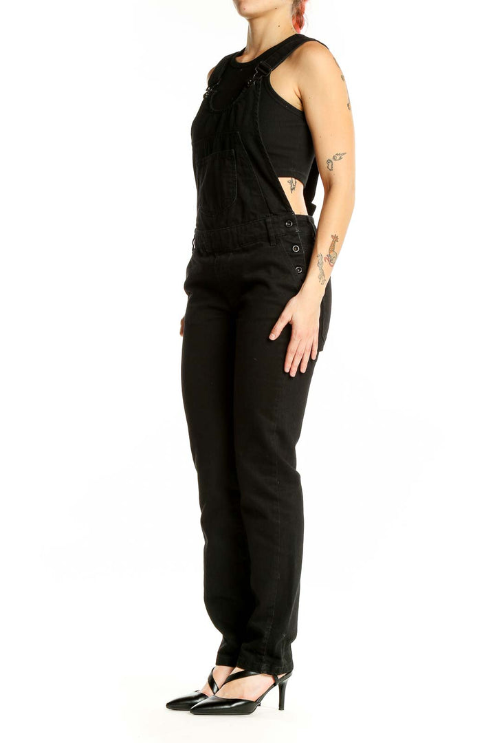 Front view of black cotton sleeveless jumpsuit from Zara Basic