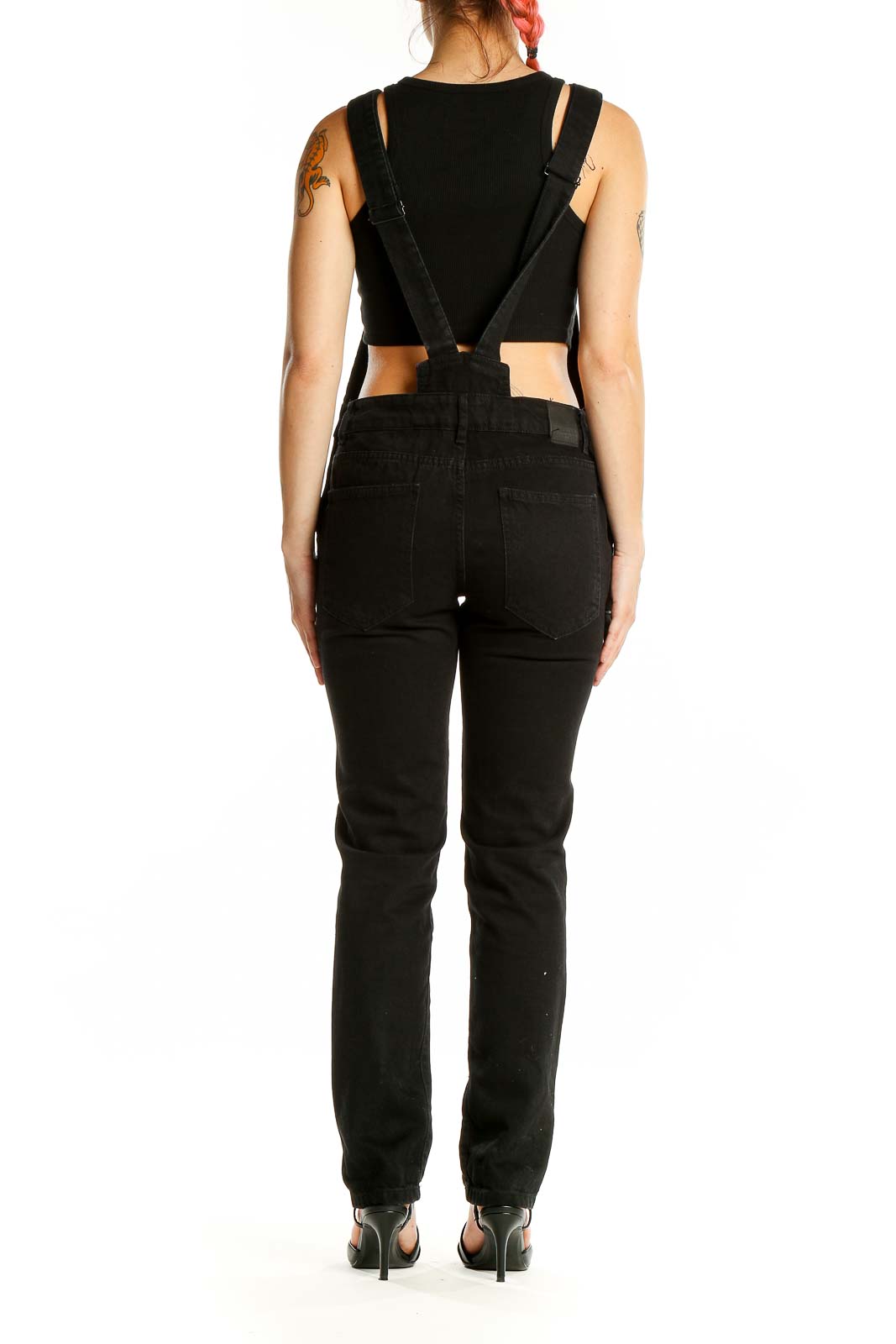 Back view of black cotton sleeveless jumpsuit from Zara Basic showing adjustable straps