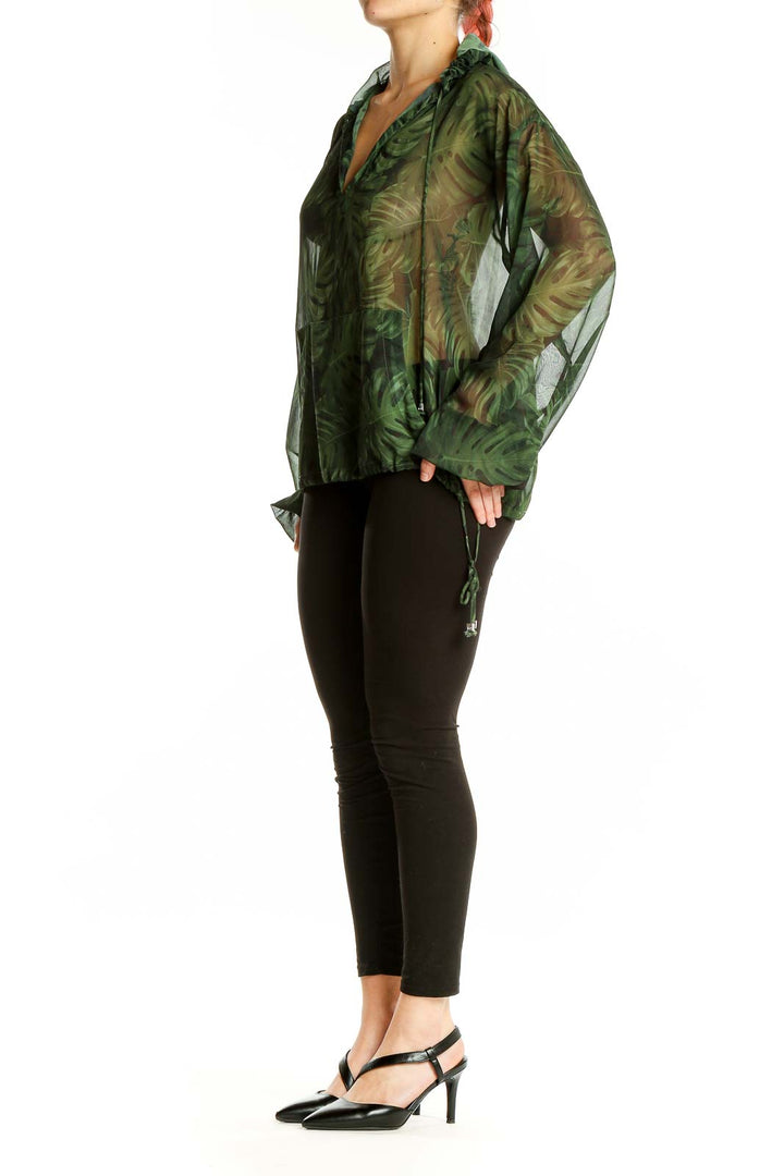 Front view of Michael Kors green tropical print sheer hoodie with v-neck